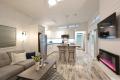 Open concept kitchen and livingroom in Cognashene cottage at Wye Cottages in Midland Ontario