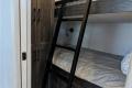 Bedroom in Beckwith cottage model at Wye Cottages in Midland Ontario