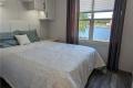 Bedroom in Sans Souci cottage model at Wye Cottages in Midland Ontario