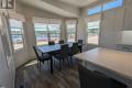 Dining area Sans Souci cottage model at Wye Cottages in Midland Ontario