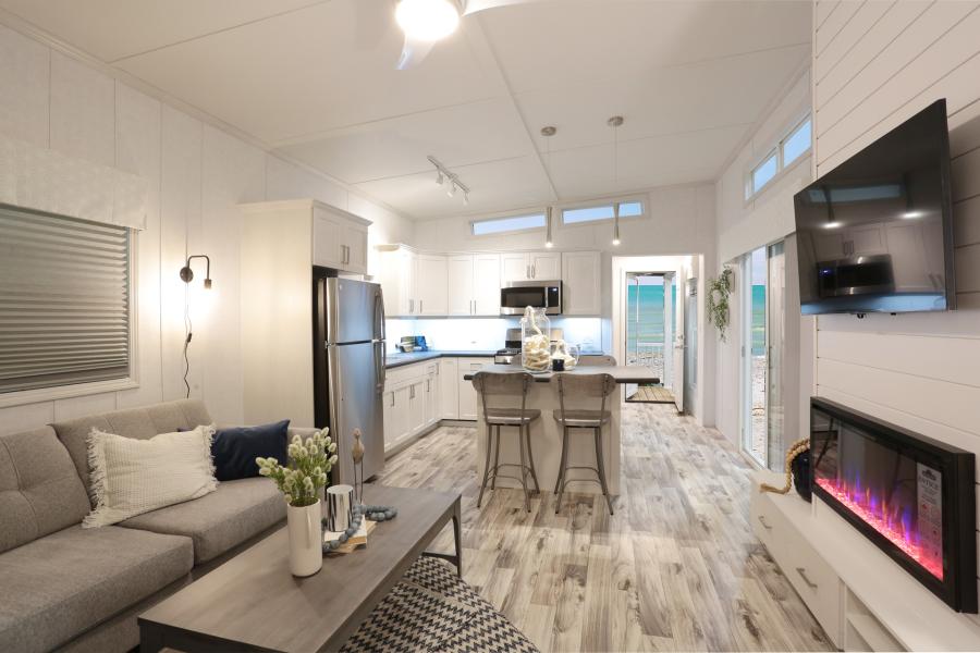 Open concept kitchen and livingroom in Cognashene cottage at Wye Cottages in Midland Ontario