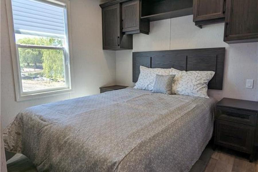 Bedroom in Beckwith cottage model at Wye Cottages in Midland Ontario
