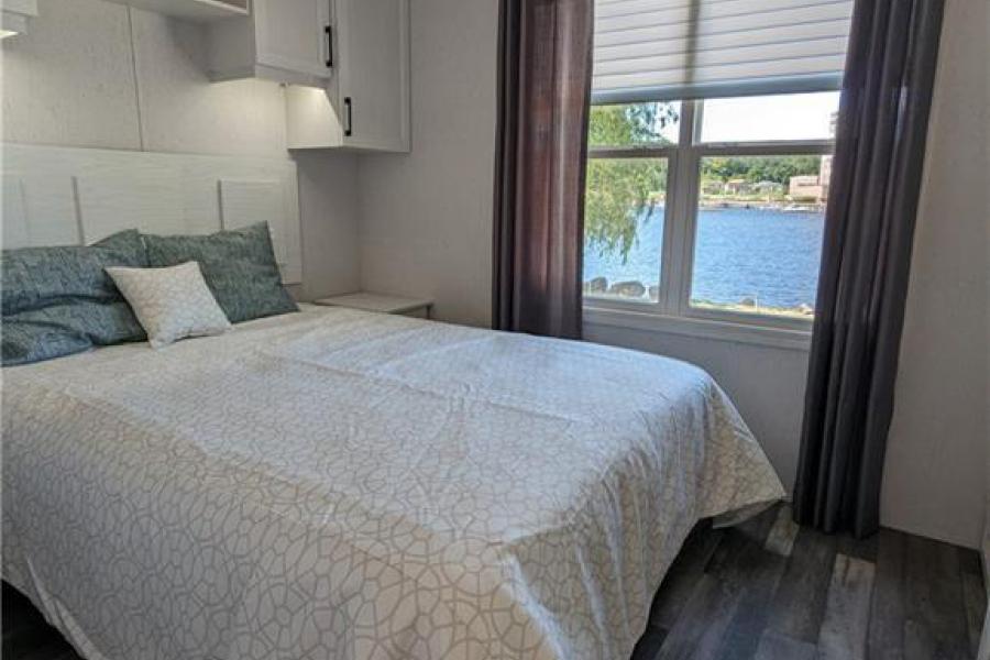 Bedroom in Sans Souci cottage model at Wye Cottages in Midland Ontario