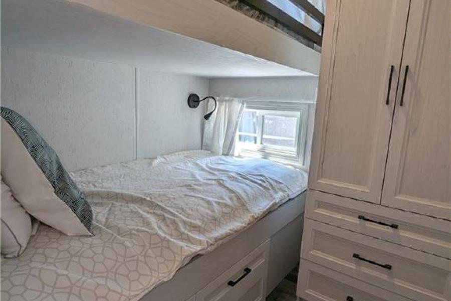 Bedroom in  Sans Souci cottage model at Wye Cottages in Midland Ontario
